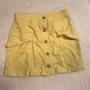 button-up yellow miniskirt